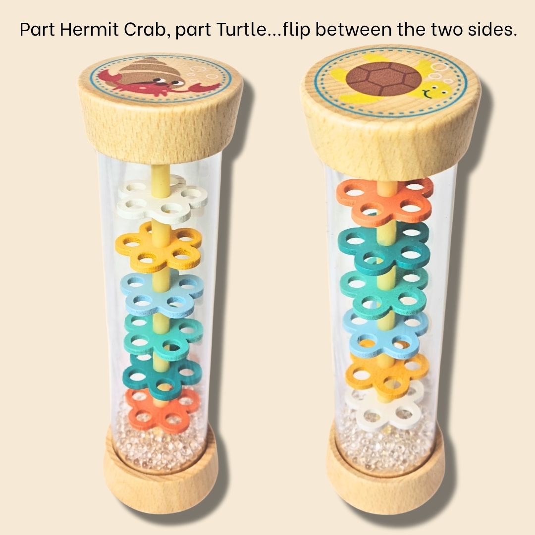 Side by side view of Hermit Crab/Turtle Rainstick instrument, each end of toy has a different sea creature. It's the one product showing what each side looks like.